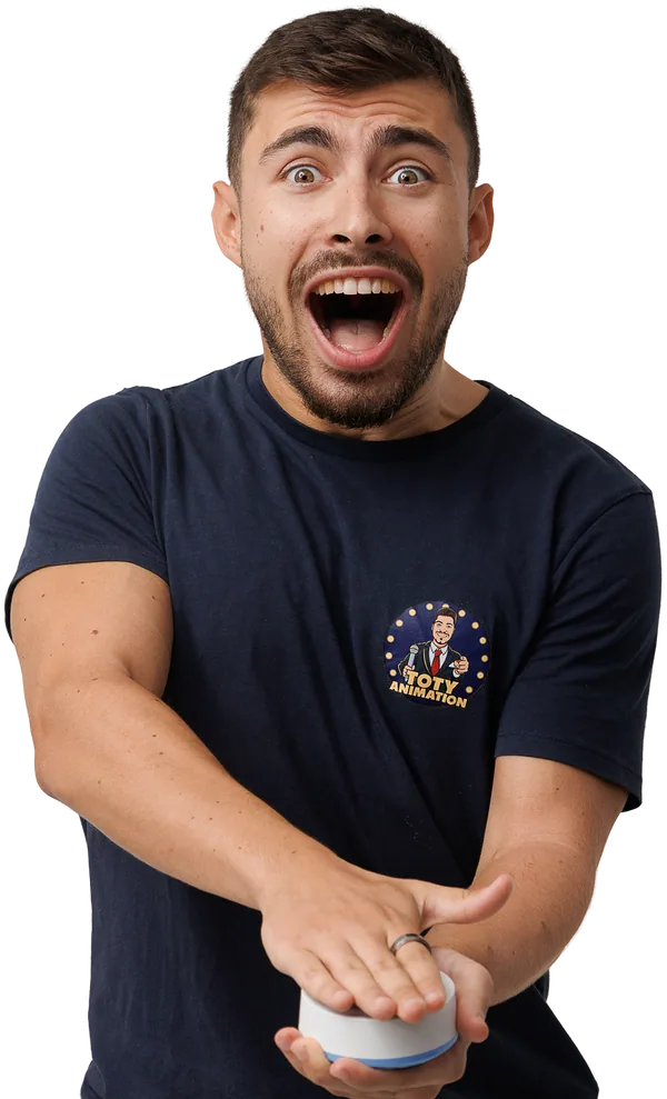Thomas Guyon en t-shirt Toty, qui appuie sur un buzzer avec un cri de joie